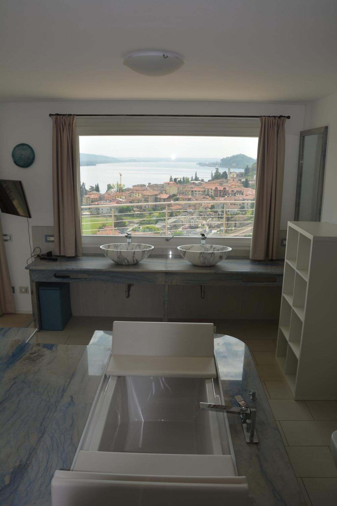 Il Girasole Apartman Meina Szoba fotó